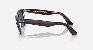 Ray-Ban Original Wayfarer RB2140 1446R5 bruin op transparant blauw, zijaanzicht
