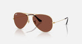 Ray-Ban Aviator RB3025 001/C5 goudkleurig met rode glazen, schuin van voren