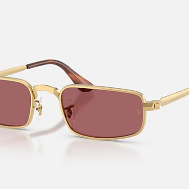Ray-Ban RB3927 by A$AP Rocky 001/AF arista goud, glazen in paars gepolariseerd – schuin vooraanzicht