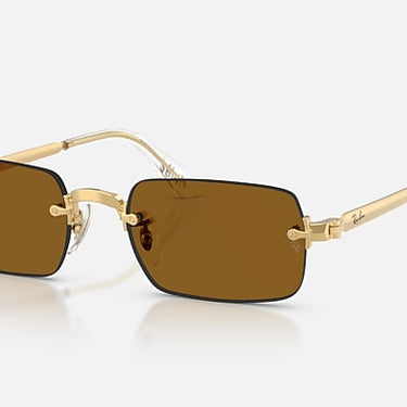 Ray-Ban RB3928 by A$AP Rocky 001/83 arista goud, glazen in donkerbruin gepolariseerd – schuin vooraanzicht