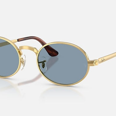 Ray-Ban RB3931 by A$AP Rocky 001/56 arista goud, glazen in blauw – schuin vooraanzicht